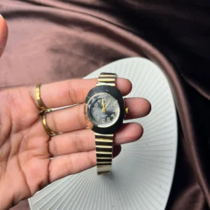 Black Oval-Dial Gold Mesh Bangle Watch