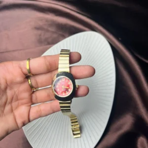 Ruby-Red Oval-Dial Gold Mesh Bangle Watch